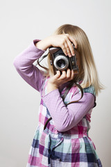 Little girl with camera