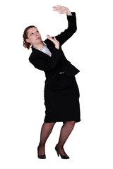 Woman protecting herself with raised hands