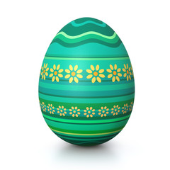 Turquois painted easter egg with flower pattern