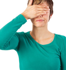 Pretty woman hides her eyes