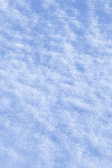 Fototapeta premium Detail of snow texture with shadows - background