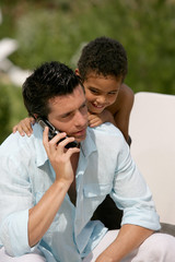 Father and son poolside