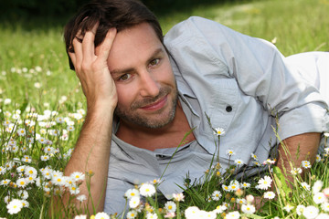 Man lying in a field