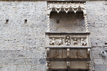 Building with Marble Balcony and Relief in Genoa, Italy