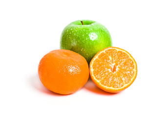 Juicy cut orange and green apple