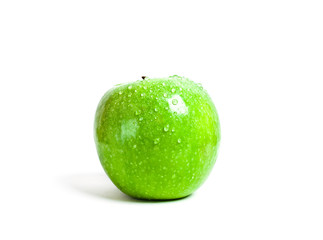Juicy green apple with water drops
