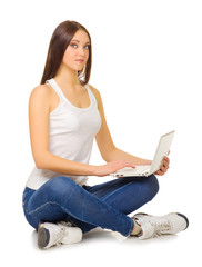 Naklejka premium Young girl with laptop