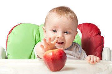 Small baby with apples