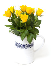 yellow roses in a vase