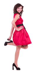 Beautiful young woman in red dress isolated