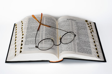 Bible with glasses