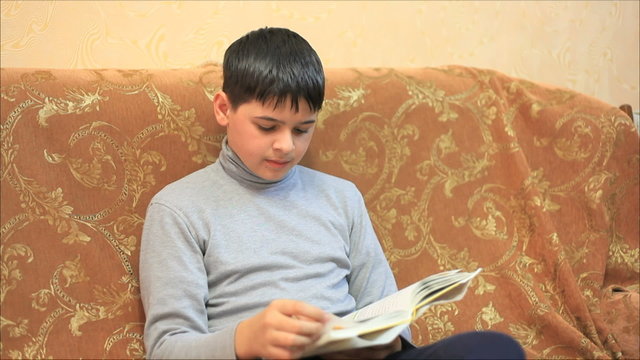Teen reading a book