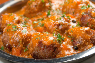 meatballs in tomato sauce on a plate