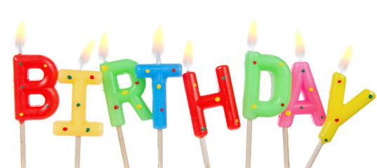 Set of colored birthday candles isolated on white