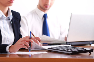 Colleagues working together in office