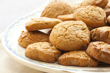 homemade almond cookies on a vintage cover