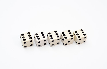 white dices showing six on top