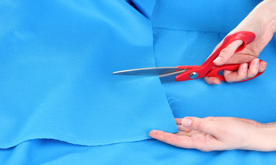 Woman cutting fabric