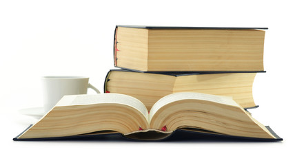 Composition with stack of books isolated on white