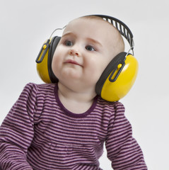 baby with ear protection