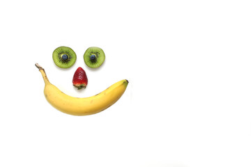 Happy face made with fruits
