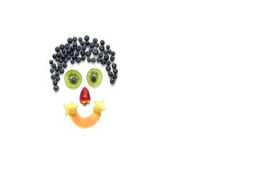 Happy face made with fruits