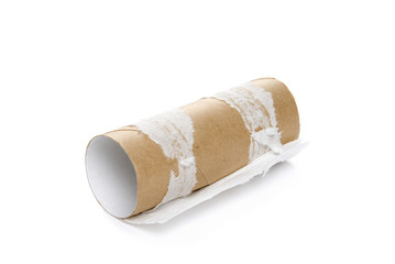 Empty toilet paper on white background