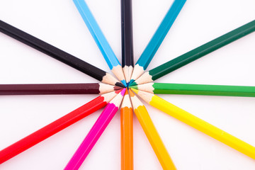 Naklejka premium Color pencils on white isolated background