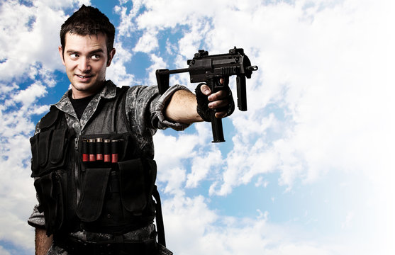 young soldier aiming