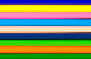 Pencils bright abstract striped background.