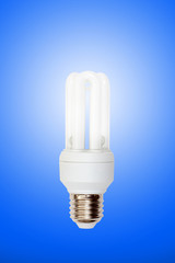 Light bulb on blue background.