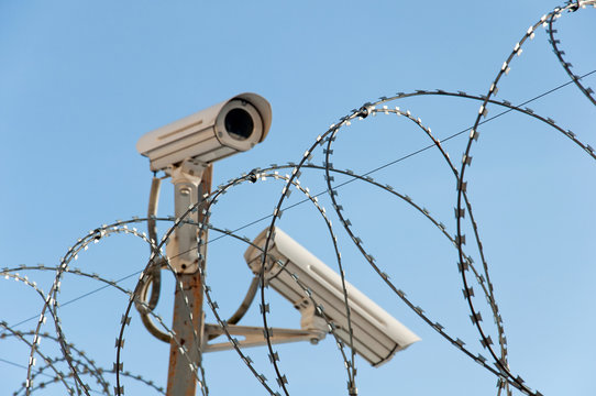 Camera surveillance and barbed wire