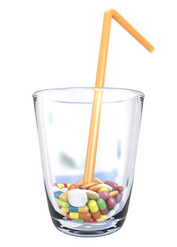 colorful drugs and orange straw in glass