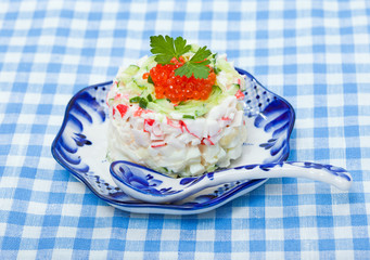 Salad with red caviar