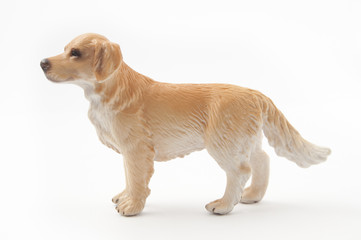 Beautiful golden retriever toy molded from plastic