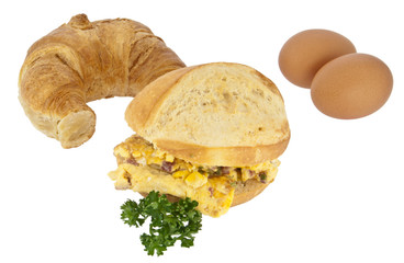 Scrambled eggs on a roll with croissant (with clipping path)