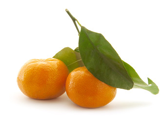 Mandarin with green leaf.