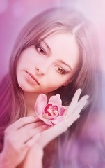 beautiful girl with orchid flower