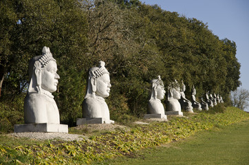 Multiple Buddhas sitting