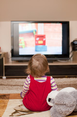child watches television
