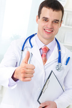 male doctor with gesture OK
