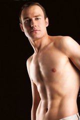 Fototapeta premium Portrait of a naked muscular man