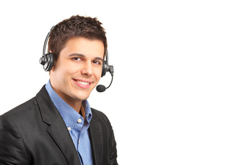 Handsome customer service operator wearing a headset
