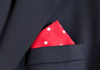 Red handkerchief in blue blazer - obrazy, fototapety, plakaty