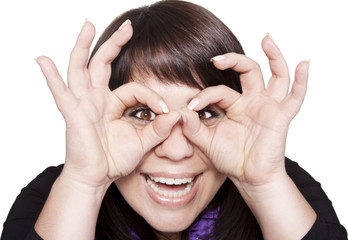 Young woman holding her hands over her eyes as glasses