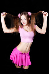 sexual young woman in a short skirt with long hair