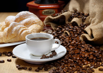 coffee cup with croissant