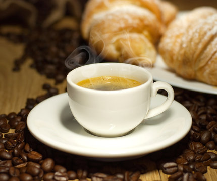 coffee cup with croissant