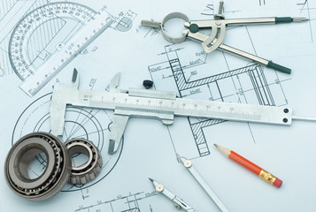 The plan industrial details, a protractor, caliper, divider and