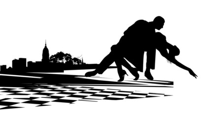 Couple dancing the tango agains  the backdrop of city buildings